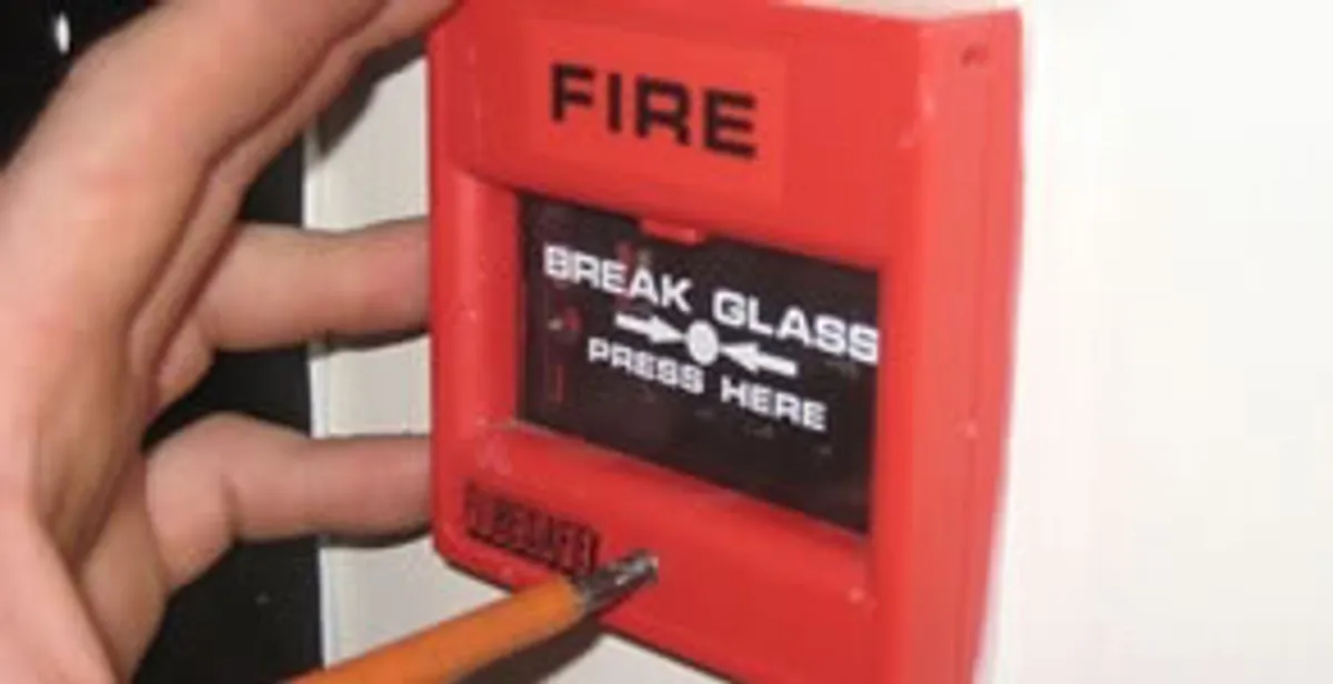 fire alarm installation service showing manual fire alarm pull station installed by licensed electricians in Tacoma, WA