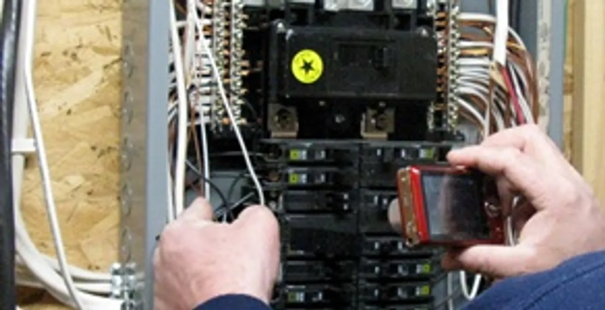 Home electrical inspection of circuit breaker panel by licensed electrician in Tacoma, WA