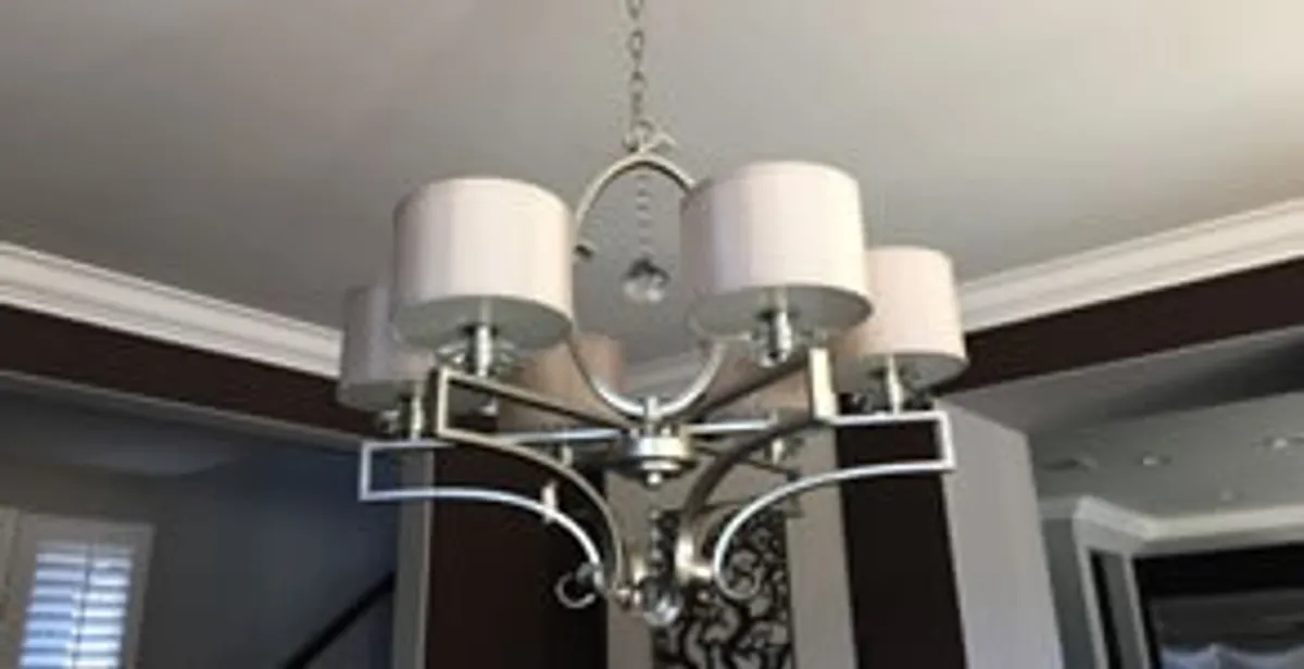 Modern chandelier installation with multiple light fixtures in Tacoma, WA