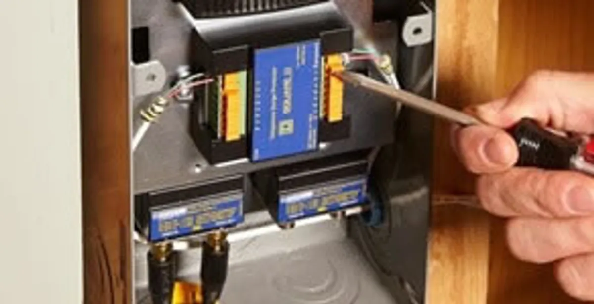 Whole home surge protection device being installed by a licensed electrician to protect electrical systems in Tacoma, WA